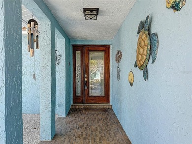 Must see beautiful waterfront pool home in the highly sought on Gulf Harbors Golf Course in Florida - for sale on GolfHomes.com, golf home, golf lot