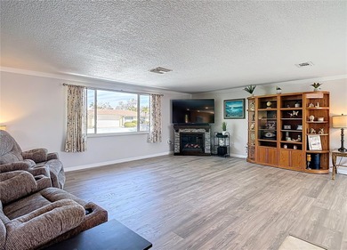 Must see beautiful waterfront pool home in the highly sought on Gulf Harbors Golf Course in Florida - for sale on GolfHomes.com, golf home, golf lot