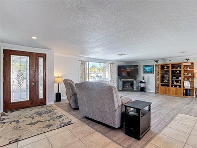 Must see beautiful waterfront pool home in the highly sought on Gulf Harbors Golf Course in Florida - for sale on GolfHomes.com, golf home, golf lot