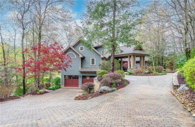 Nestled on a sprawling 1.4-acre lot, this 5,400 square foot on The Cliffs at Glassy Golf and Country Club in South Carolina - for sale on GolfHomes.com, golf home, golf lot