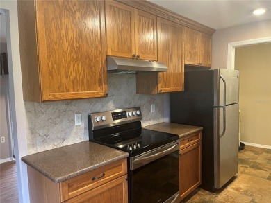 Looking for an UPDATED, move-in ready condo? Look no further on Heather Golf and Country Club in Florida - for sale on GolfHomes.com, golf home, golf lot