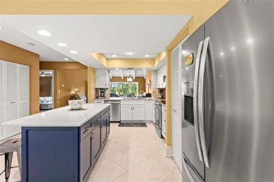 WHAT AN AMAZING HIGH END REMODEL WITH NOTHING  LEFT UNDONE on Bardmoor Golf and Tennis Club in Florida - for sale on GolfHomes.com, golf home, golf lot