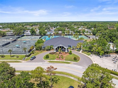WHAT AN AMAZING HIGH END REMODEL WITH NOTHING  LEFT UNDONE on Bardmoor Golf and Tennis Club in Florida - for sale on GolfHomes.com, golf home, golf lot