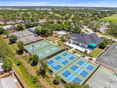 WHAT AN AMAZING HIGH END REMODEL WITH NOTHING  LEFT UNDONE on Bardmoor Golf and Tennis Club in Florida - for sale on GolfHomes.com, golf home, golf lot
