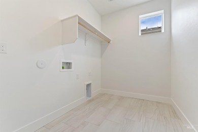 This brand-new, single-story home is located at Trilogy Valor, a on Falcon Crest Golf Club in Idaho - for sale on GolfHomes.com, golf home, golf lot