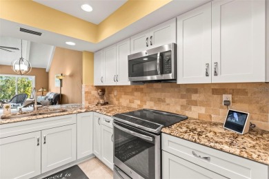 WHAT AN AMAZING HIGH END REMODEL WITH NOTHING  LEFT UNDONE on Bardmoor Golf and Tennis Club in Florida - for sale on GolfHomes.com, golf home, golf lot