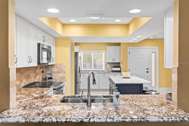 WHAT AN AMAZING HIGH END REMODEL WITH NOTHING  LEFT UNDONE on Bardmoor Golf and Tennis Club in Florida - for sale on GolfHomes.com, golf home, golf lot