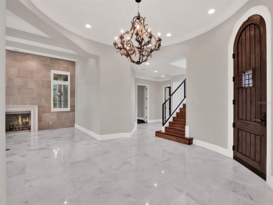 A perfect blend of Mediterranean and contemporary Transitional on Lake Nona Golf Club, Inc. in Florida - for sale on GolfHomes.com, golf home, golf lot