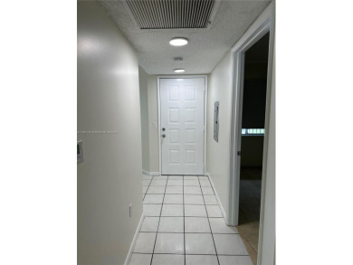 Beautifully Renovated 2-Bedroom Condo with Pool View - Century on Flamingo Lakes Country Club in Florida - for sale on GolfHomes.com, golf home, golf lot