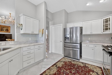 STUNNING, BLOCK and STUCCO 3/2 IRIS with GLASS ENCLOSED LANAI on Pennbrooke Fairways in Florida - for sale on GolfHomes.com, golf home, golf lot