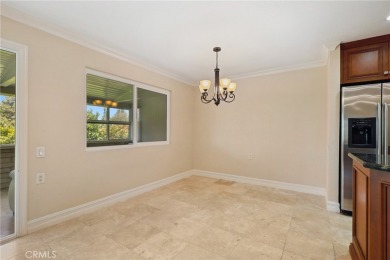 Beautifully updated lower-level Catalina end unit in a peaceful on Leisure Village Par 3 Golf Course in California - for sale on GolfHomes.com, golf home, golf lot