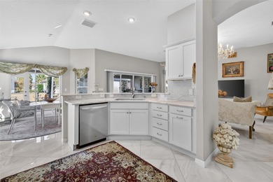 STUNNING, BLOCK and STUCCO 3/2 IRIS with GLASS ENCLOSED LANAI on Pennbrooke Fairways in Florida - for sale on GolfHomes.com, golf home, golf lot