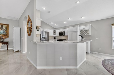 STUNNING, BLOCK and STUCCO 3/2 IRIS with GLASS ENCLOSED LANAI on Pennbrooke Fairways in Florida - for sale on GolfHomes.com, golf home, golf lot