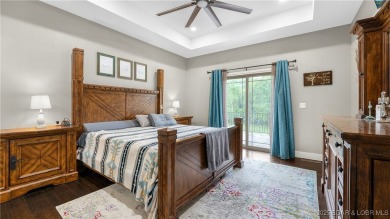 Welcome to this 6-bedroom, 4-full bath home, perfectly on Seasons Ridge At Four Seasons in Missouri - for sale on GolfHomes.com, golf home, golf lot