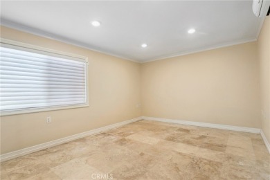 Beautifully updated lower-level Catalina end unit in a peaceful on Leisure Village Par 3 Golf Course in California - for sale on GolfHomes.com, golf home, golf lot