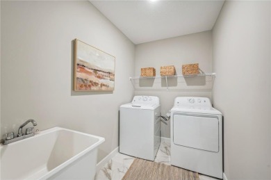 This home is under construction with an estimated completion end on Sanbrook Golf Course in Minnesota - for sale on GolfHomes.com, golf home, golf lot