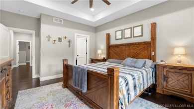 Welcome to this 6-bedroom, 4-full bath home, perfectly on Seasons Ridge At Four Seasons in Missouri - for sale on GolfHomes.com, golf home, golf lot