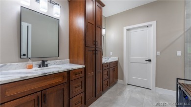 Welcome to this 6-bedroom, 4-full bath home, perfectly on Seasons Ridge At Four Seasons in Missouri - for sale on GolfHomes.com, golf home, golf lot