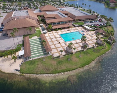 Beautifully Renovated 2-Bedroom Condo with Pool View - Century on Flamingo Lakes Country Club in Florida - for sale on GolfHomes.com, golf home, golf lot