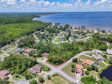 Discover the perfect canvas for your custom dream home on this on Holiday Golf Club in Florida - for sale on GolfHomes.com, golf home, golf lot