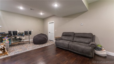 Welcome to this 6-bedroom, 4-full bath home, perfectly on Seasons Ridge At Four Seasons in Missouri - for sale on GolfHomes.com, golf home, golf lot