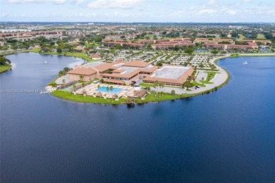 Beautifully Renovated 2-Bedroom Condo with Pool View - Century on Flamingo Lakes Country Club in Florida - for sale on GolfHomes.com, golf home, golf lot