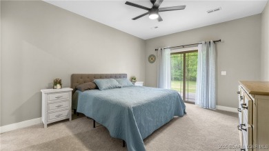 Welcome to this 6-bedroom, 4-full bath home, perfectly on Seasons Ridge At Four Seasons in Missouri - for sale on GolfHomes.com, golf home, golf lot