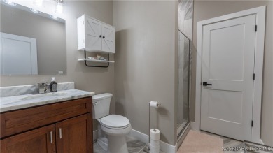 Welcome to this 6-bedroom, 4-full bath home, perfectly on Seasons Ridge At Four Seasons in Missouri - for sale on GolfHomes.com, golf home, golf lot