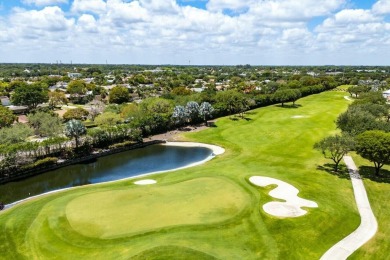 This expansive, custom-built estate offers luxurious on Bocaire Country Club in Florida - for sale on GolfHomes.com, golf home, golf lot