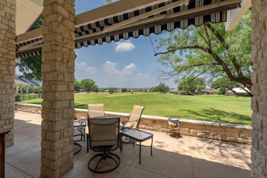 Exquisite and stylishly updated golf course home with enclosed on Slick Rock Golf Course - Horseshoe Bay in Texas - for sale on GolfHomes.com, golf home, golf lot