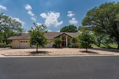 Exquisite and stylishly updated golf course home with enclosed on Slick Rock Golf Course - Horseshoe Bay in Texas - for sale on GolfHomes.com, golf home, golf lot