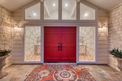 Exquisite and stylishly updated golf course home with enclosed on Slick Rock Golf Course - Horseshoe Bay in Texas - for sale on GolfHomes.com, golf home, golf lot