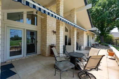 Exquisite and stylishly updated golf course home with enclosed on Slick Rock Golf Course - Horseshoe Bay in Texas - for sale on GolfHomes.com, golf home, golf lot