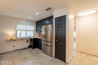 This beautifully updated home is nestled on a quiet cul-de-sac on The Duke At Rancho El Dorado Golf Course in Arizona - for sale on GolfHomes.com, golf home, golf lot