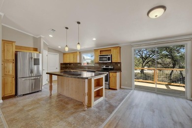 Golf course views.  Located across from fairway 15 of The Club on Rebecca Creek Golf Club in Texas - for sale on GolfHomes.com, golf home, golf lot