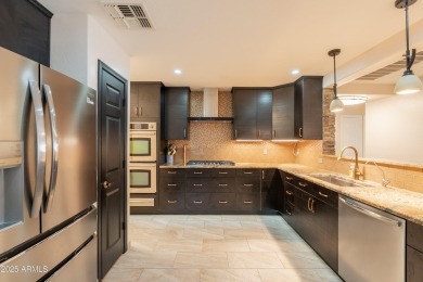 This beautifully updated home is nestled on a quiet cul-de-sac on The Duke At Rancho El Dorado Golf Course in Arizona - for sale on GolfHomes.com, golf home, golf lot