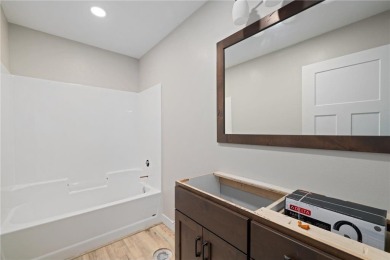 Discover this beautifully crafted home ideally situated with on Headwaters Country Club in Minnesota - for sale on GolfHomes.com, golf home, golf lot