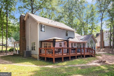 Welcome home to this spacious and well-maintained 4-bedroom, 2 on Braelinn Golf Club in Georgia - for sale on GolfHomes.com, golf home, golf lot