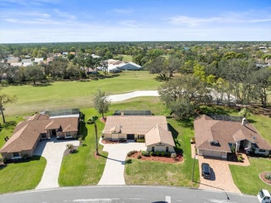 This 1990 Alexander Boca Grande Deluxe pool home is located on on Glen Lakes Country Club in Florida - for sale on GolfHomes.com, golf home, golf lot