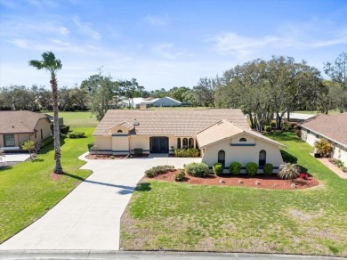 This 1990 Alexander Boca Grande Deluxe pool home is located on on Glen Lakes Country Club in Florida - for sale on GolfHomes.com, golf home, golf lot