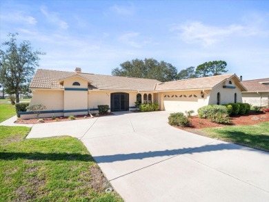 This 1990 Alexander Boca Grande Deluxe pool home is located on on Glen Lakes Country Club in Florida - for sale on GolfHomes.com, golf home, golf lot