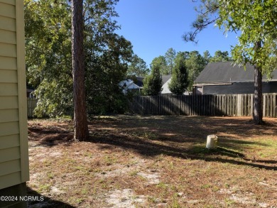 This 3 bedroom 2 bath home in Boiling Spring Lakes provides both on The Lakes Country Club in North Carolina - for sale on GolfHomes.com, golf home, golf lot