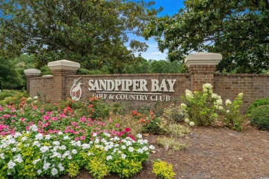 The best in southern living starts here. Discover comfort, style on Sandpiper Bay Golf and Country Club in North Carolina - for sale on GolfHomes.com, golf home, golf lot