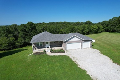 Immerse yourself in the elegance of this beautiful custom built on Hidden Valley Golf Links in Missouri - for sale on GolfHomes.com, golf home, golf lot