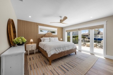 Welcome to your dream home!  This fully renovated, never lived on Key Royale Club in Florida - for sale on GolfHomes.com, golf home, golf lot