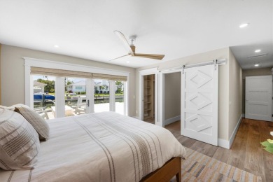 Welcome to your dream home!  This fully renovated, never lived on Key Royale Club in Florida - for sale on GolfHomes.com, golf home, golf lot