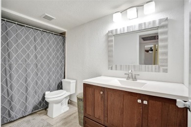 Come view this stunning 3 bedroom 2 1/2 bathroom updated on Pine Island Ridge Country Club in Florida - for sale on GolfHomes.com, golf home, golf lot