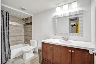 Come view this stunning 3 bedroom 2 1/2 bathroom updated on Pine Island Ridge Country Club in Florida - for sale on GolfHomes.com, golf home, golf lot
