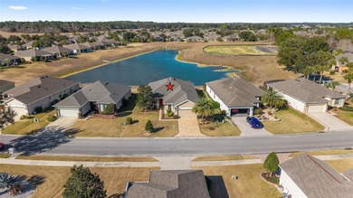Discover this beautiful Shenandoah model overlooking priceless on Stone Creek Golf Club in Florida - for sale on GolfHomes.com, golf home, golf lot