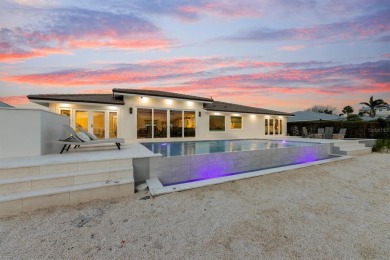 Welcome to your dream home!  This fully renovated, never lived on Key Royale Club in Florida - for sale on GolfHomes.com, golf home, golf lot